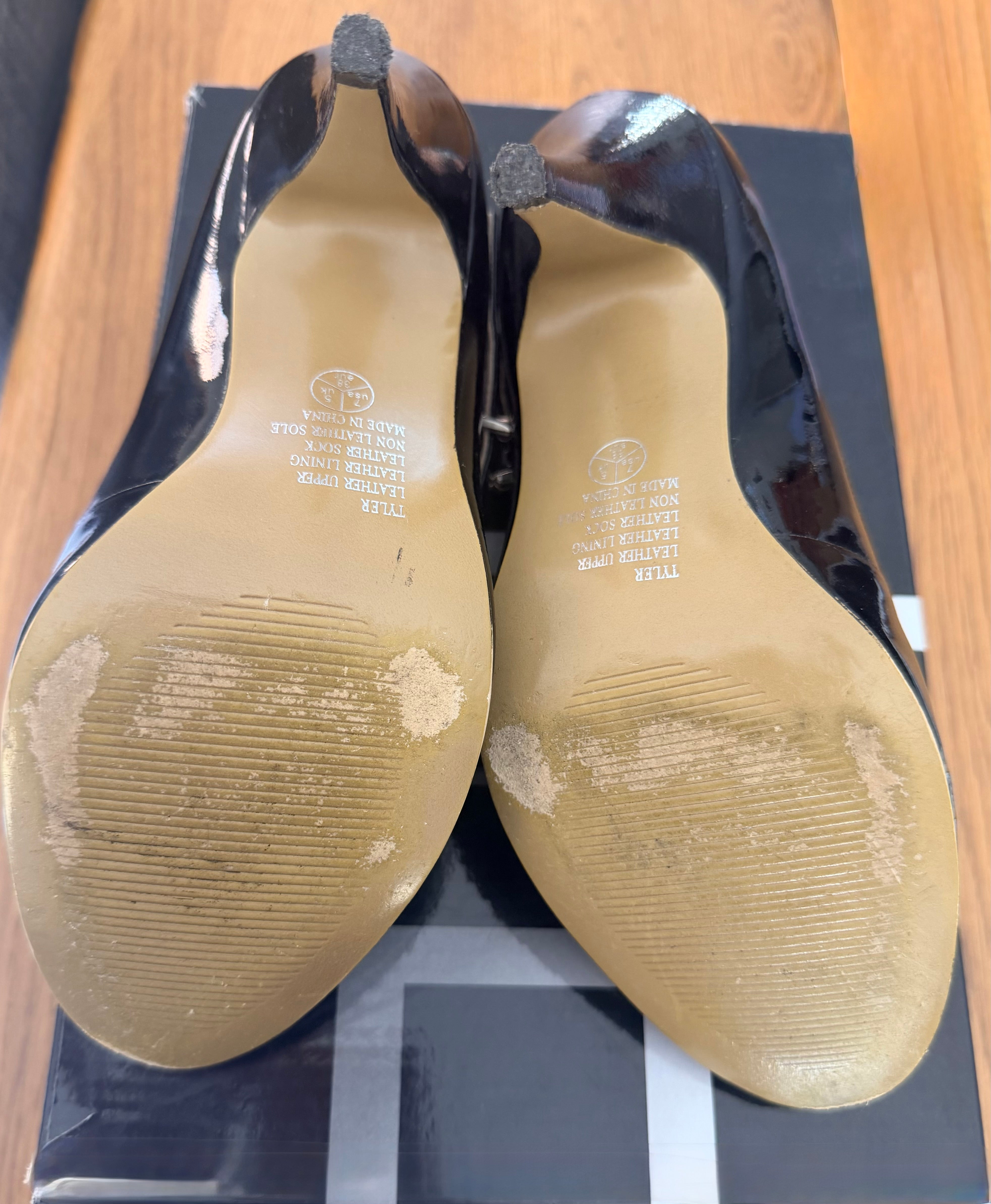 ZU  Tyler Black Patent